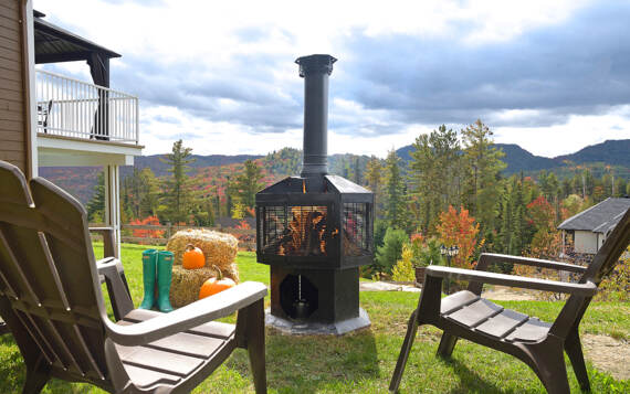 Foyer extérieur bois de chauffage gratuit avec location Chalet de La Montagne Saint-Côme